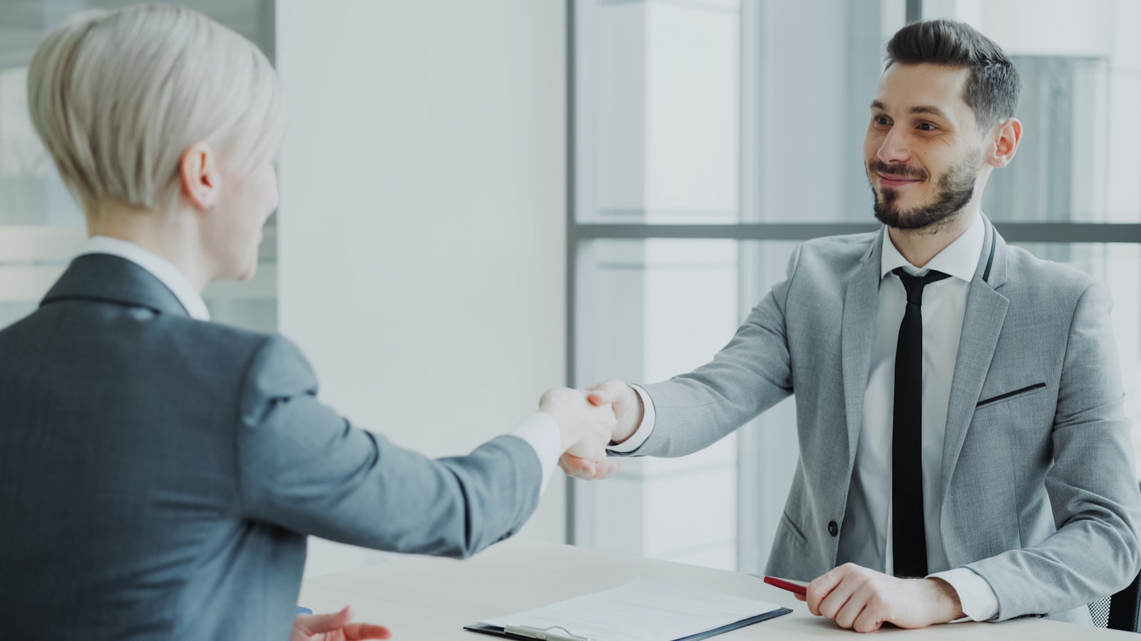Insurance and notary agent helping a client