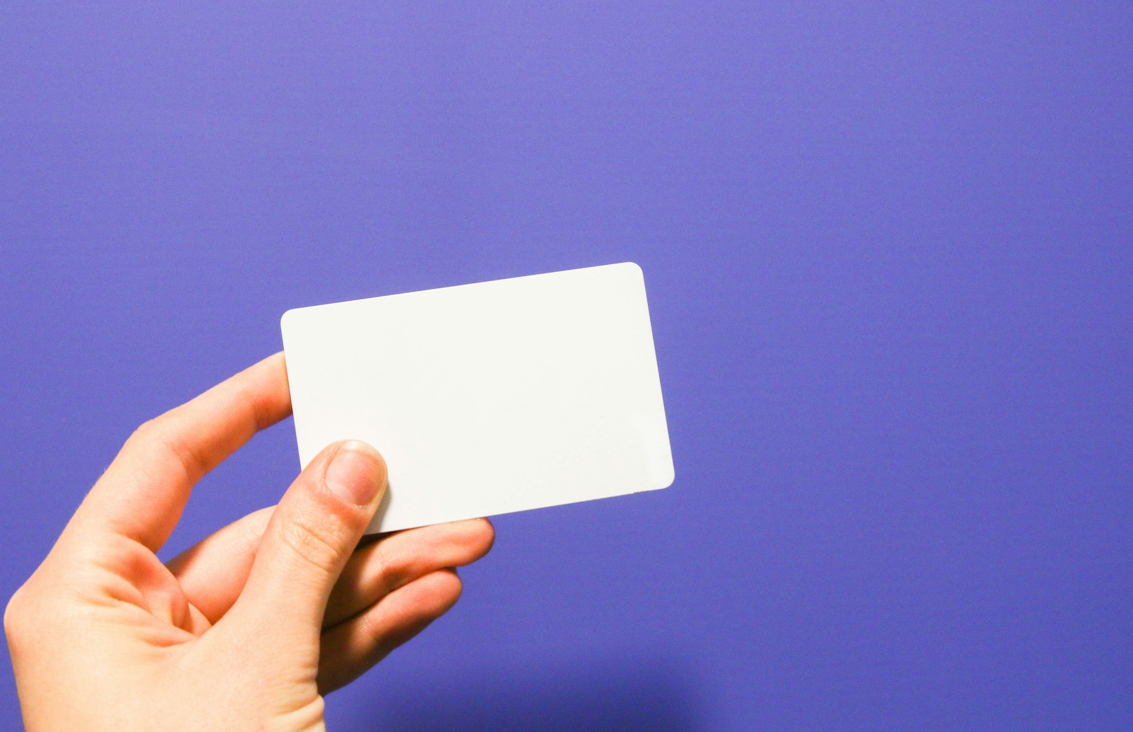A notary checking photo identification before a Pennsylvania title transfer
