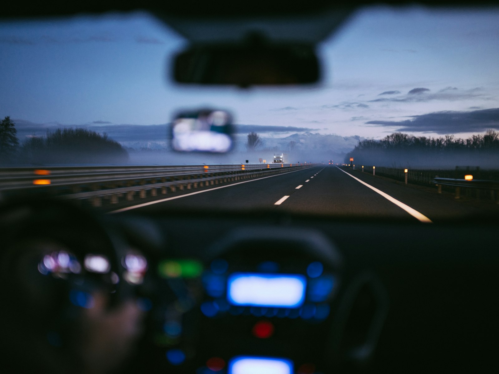 Checking the vehicle identification number on a car dashboard