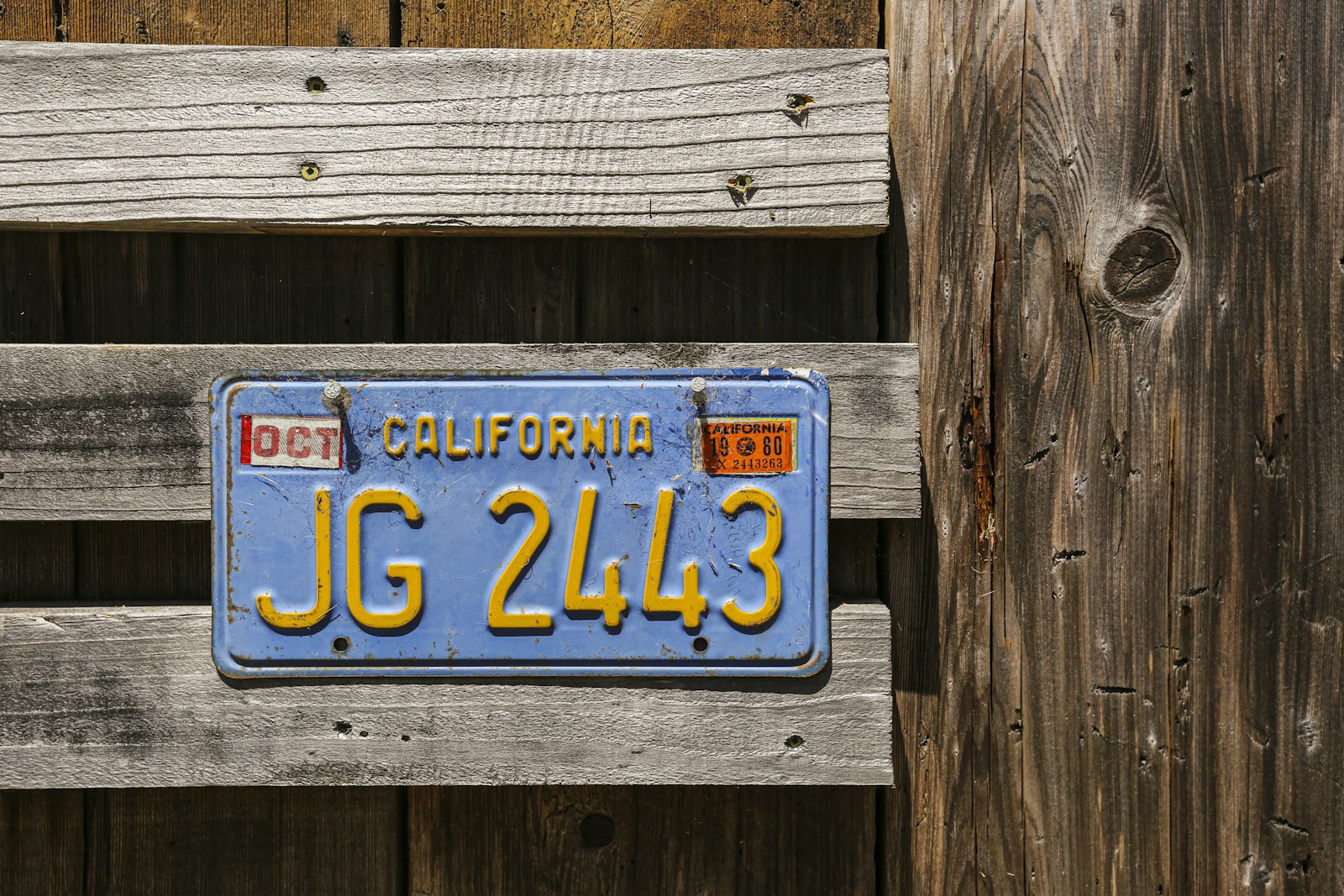 A faded plate eligible for free replacement in Pennsylvania