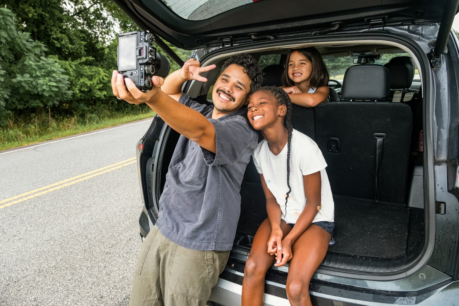 A family completing a gift title transfer for a vehicle in Pennsylvania